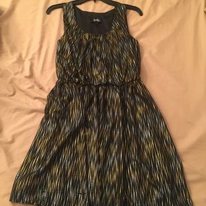 Black dress with gold and silver accents